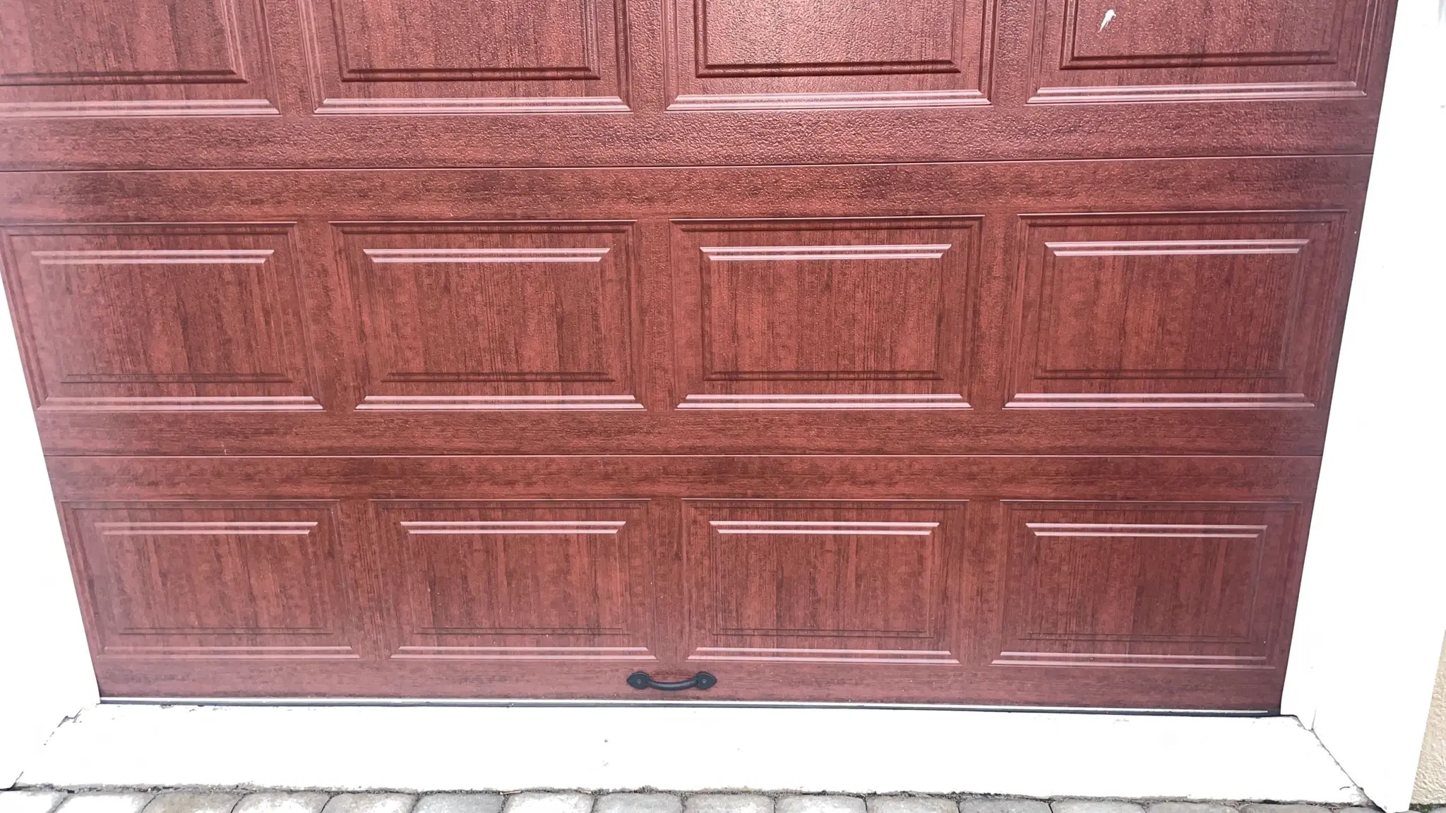 Garage door repair work in progress for a local service call